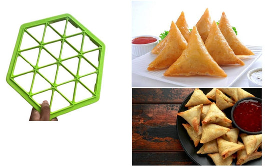 Green hexagonal pastry cutter with samosas and ketchup on a white plate.